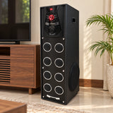 CEMEX Bumper 844-T black tower speaker placed in a modern living room with television